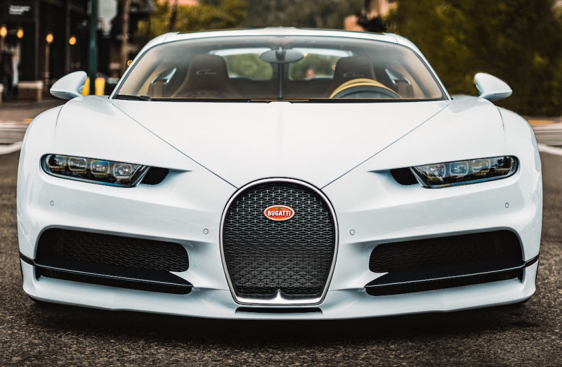 Fancy sports car parked on road.