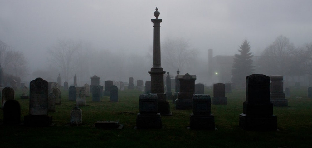 Old foggy cemetery. 